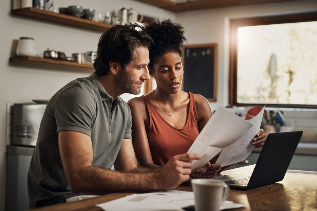 couple looking at paperwork together