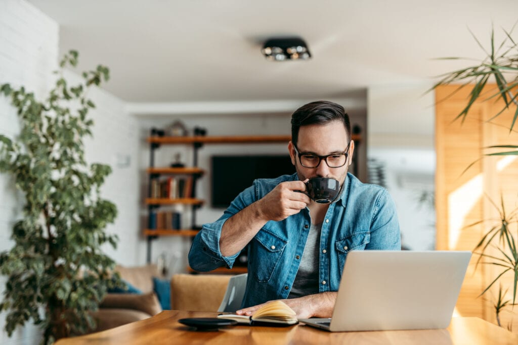 man drinking espresso working from home FLPnn