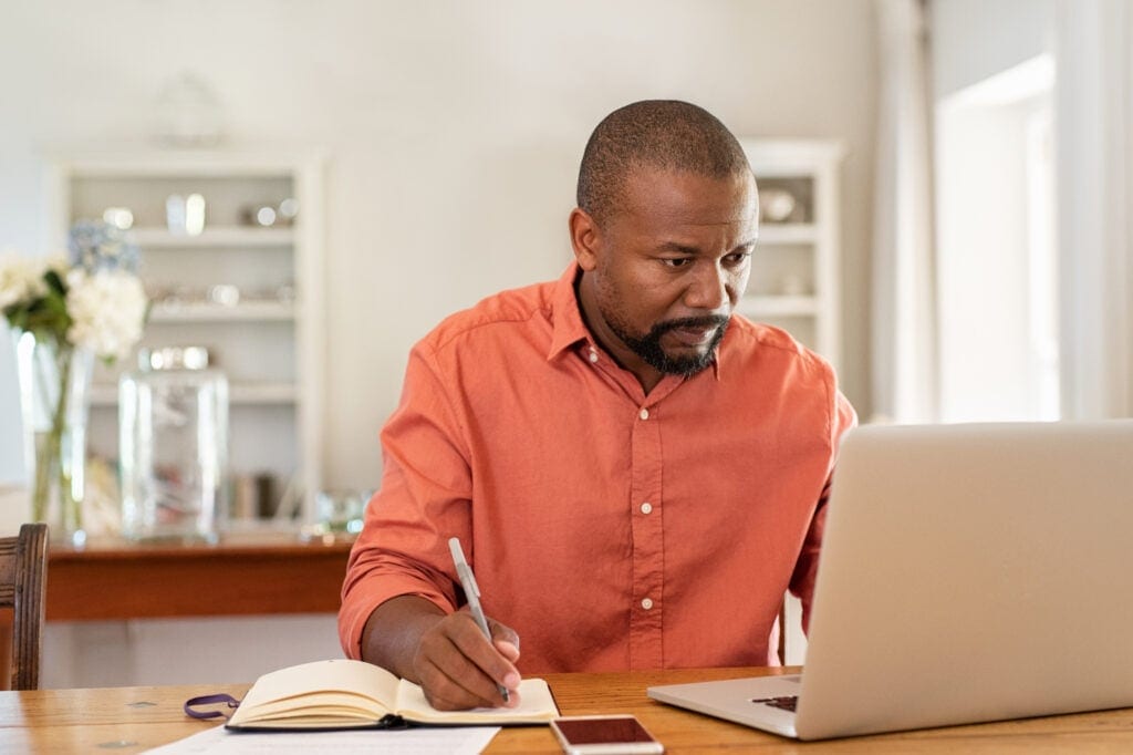 middle aged man at laptop gettyimages rFfN