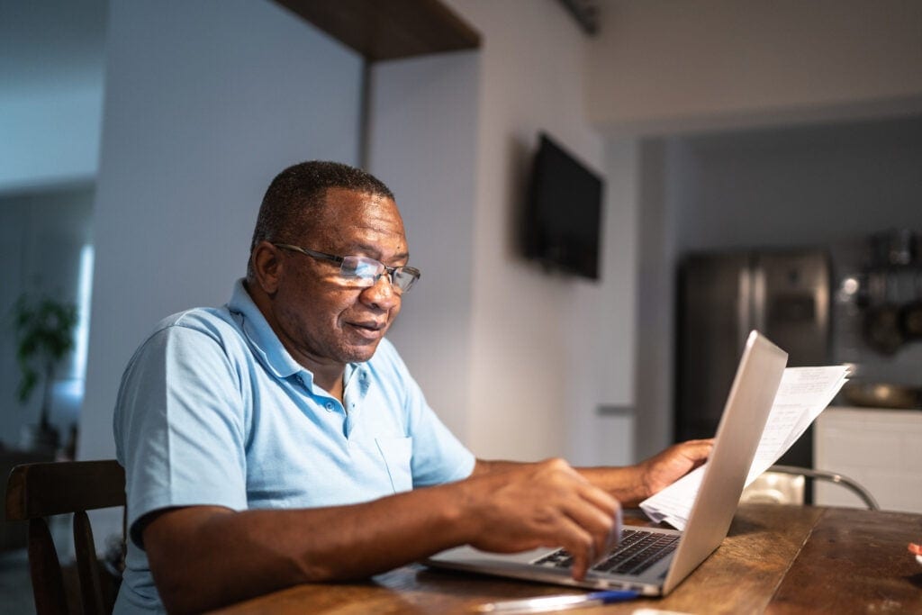 older man at laptop gettyimages