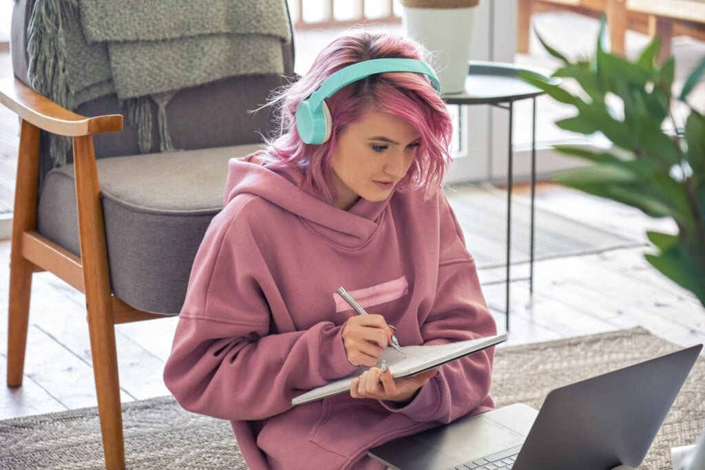 listening learning headphones laptop notes studying