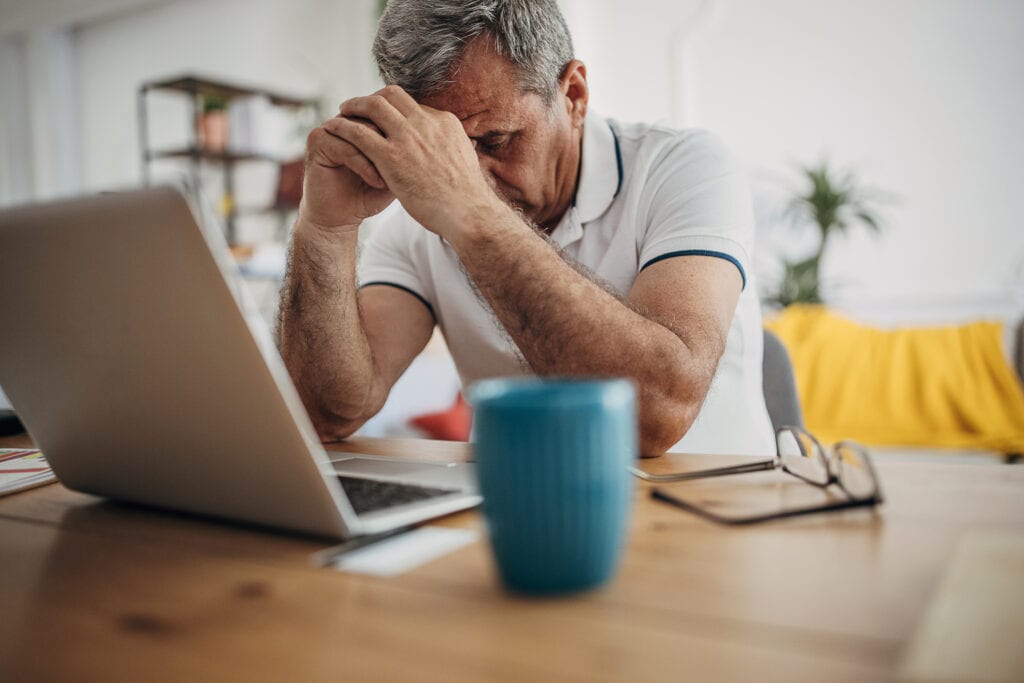 older man laptop upset gettyimages