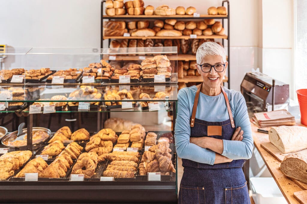 older woman bakery working gettyimages