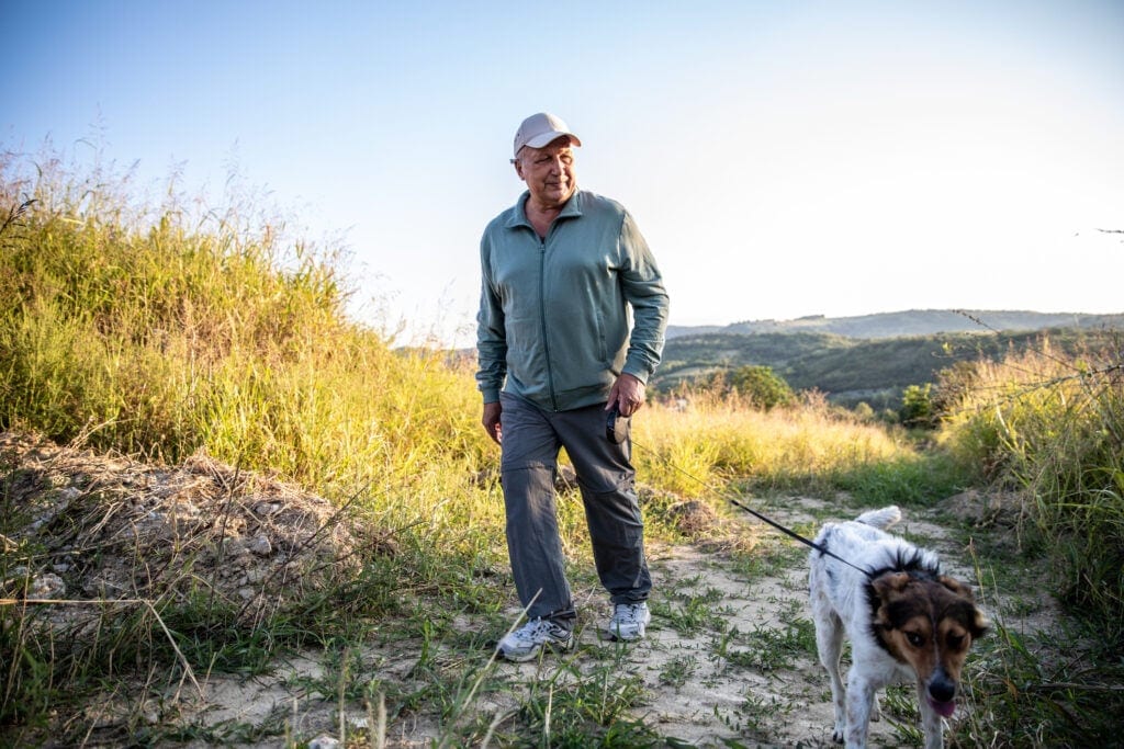 older man walking doggettyimages
