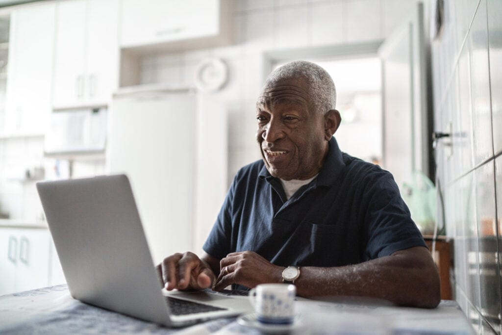 senior man laptop gettyimages