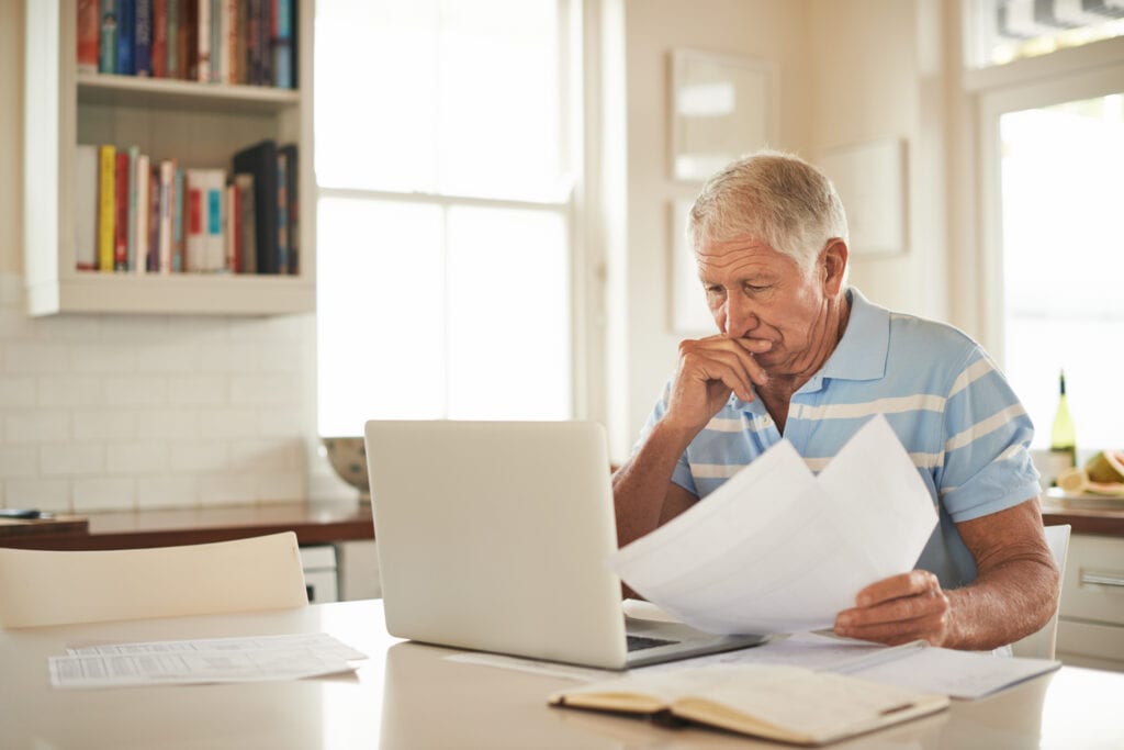 senior man laptop stressed gettyimages