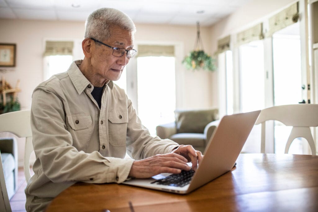 typing on laptop