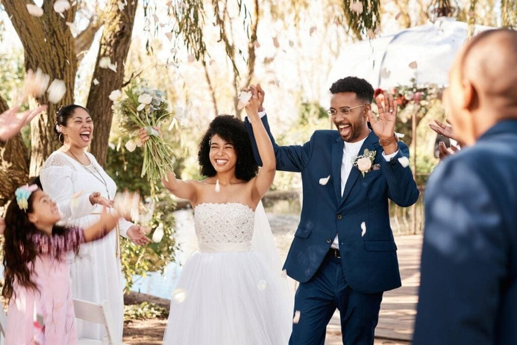 bride and groom cheering at wedding arpIRny.width