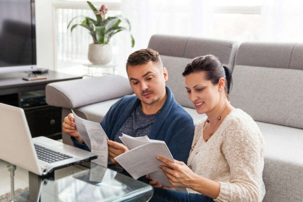 couple organizing paperwork.width