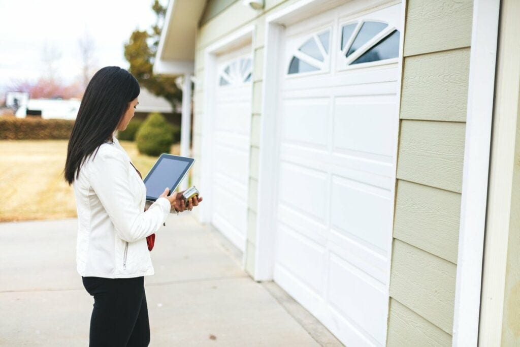 person appraising garage of home ywtXvs.width .jpg