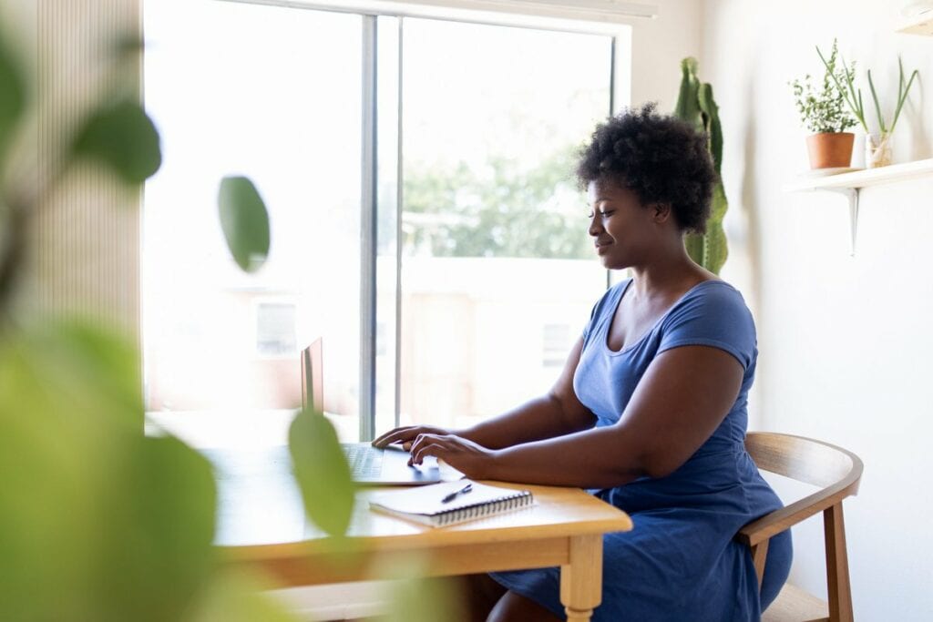person working at home on laptop eHAgcI.width