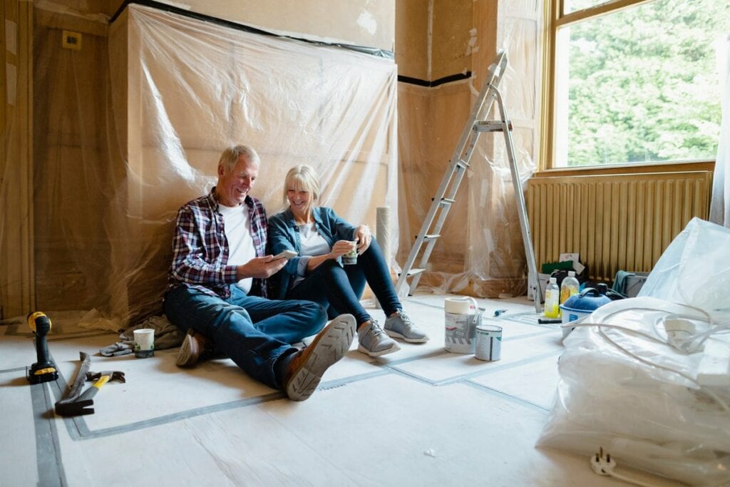 Couple sitting relaxing in a room thats under.width tylU.jpg