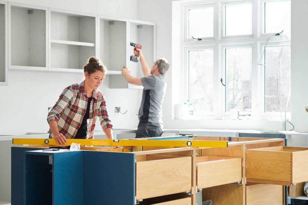 Man and woman working on a kitchen remodel TD.width .jpg