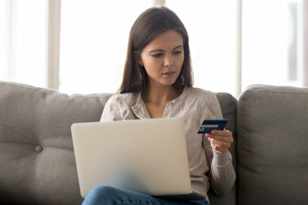 Woman with credit card laptop XrheSHb.width .jpg