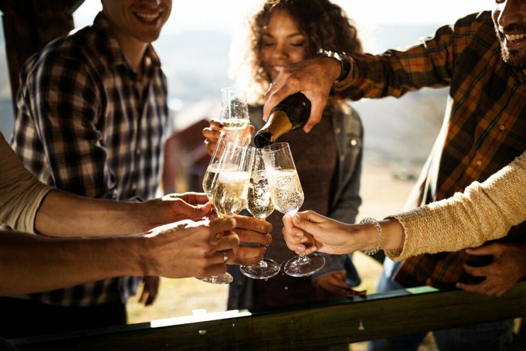 friends drinking champagne gvgg.width .jpg