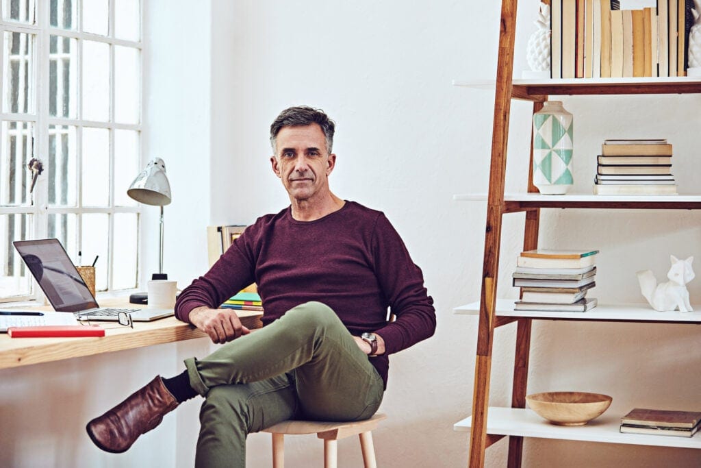 man middle aged at desk gettyimages .jpg