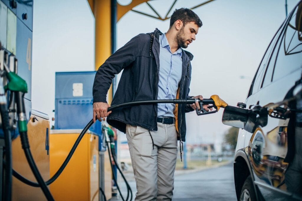 person pumping gas into car WkyEFR.width .jpg