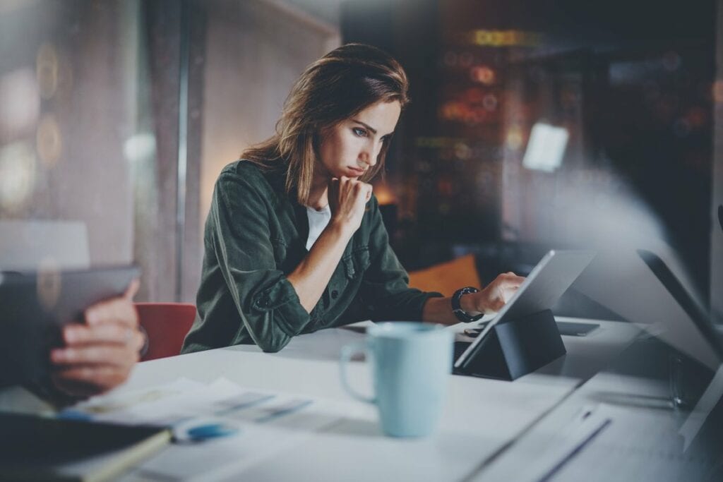 woman studying tablet PVHKw.width .jpg