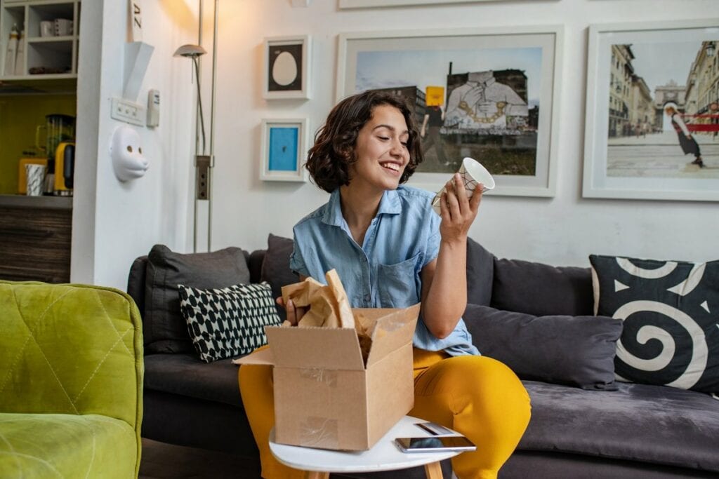 woman unpacking delivery oQULHp.width .jpg