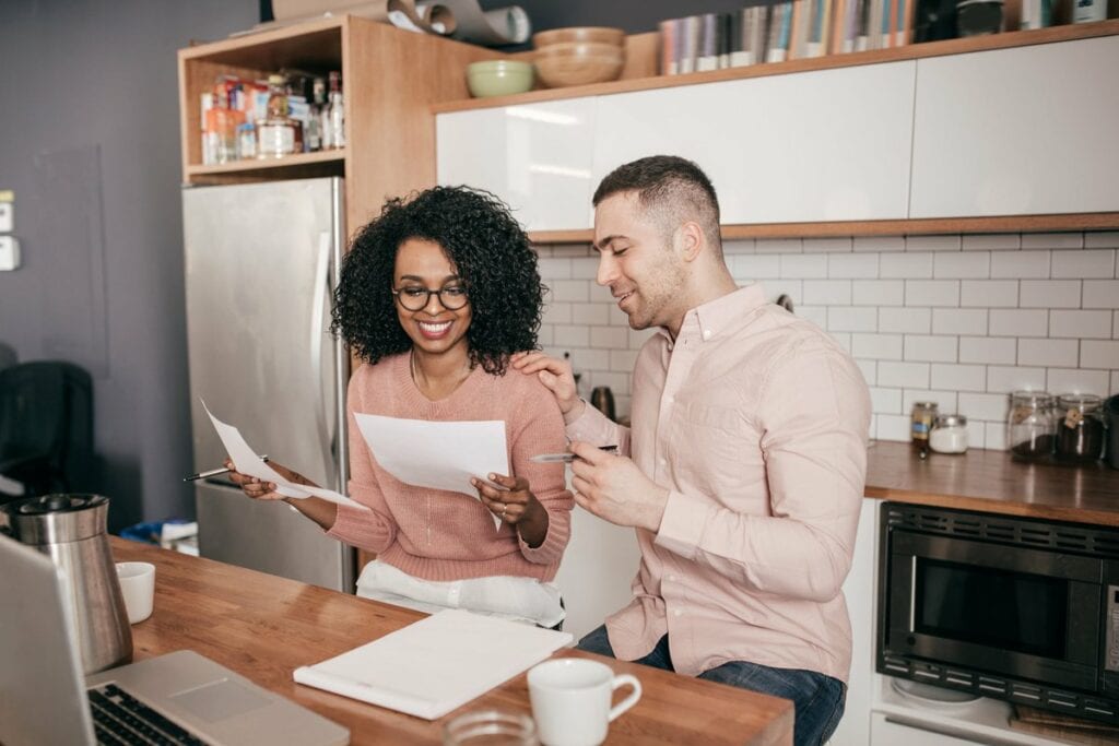 Couple looking over paperwork together in the.width YOgSVXc.jpg