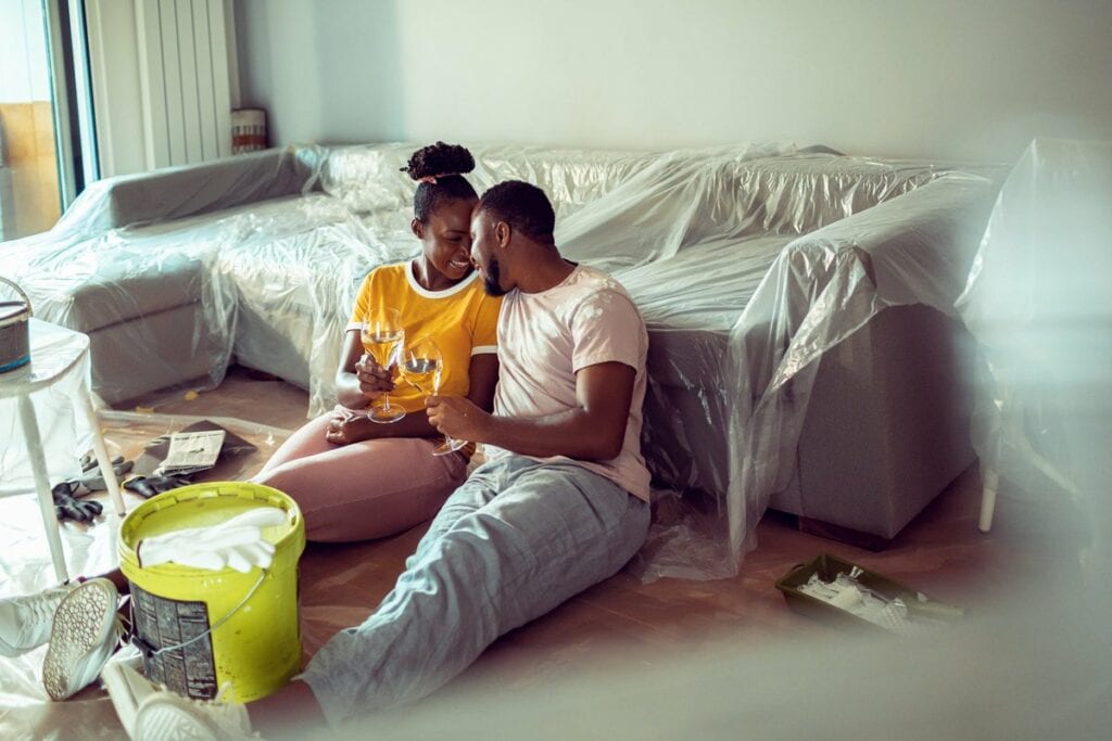 Couple taking a break from painting living ro.width VaYFp.jpg