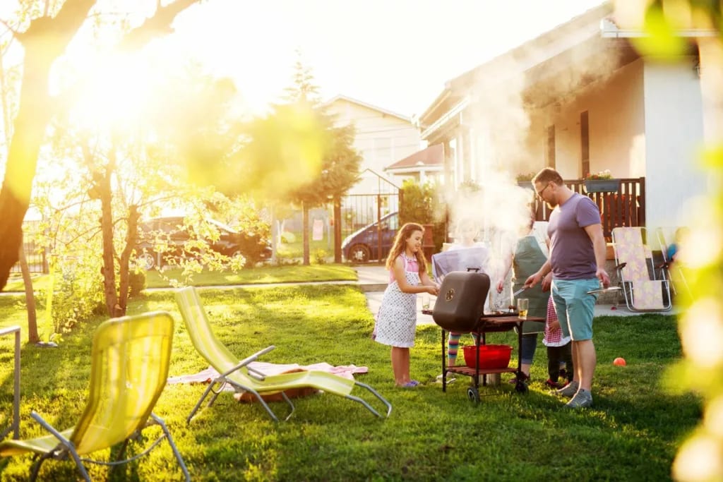 Family bbq in sunny backyard PHUBXgk.width .jpg
