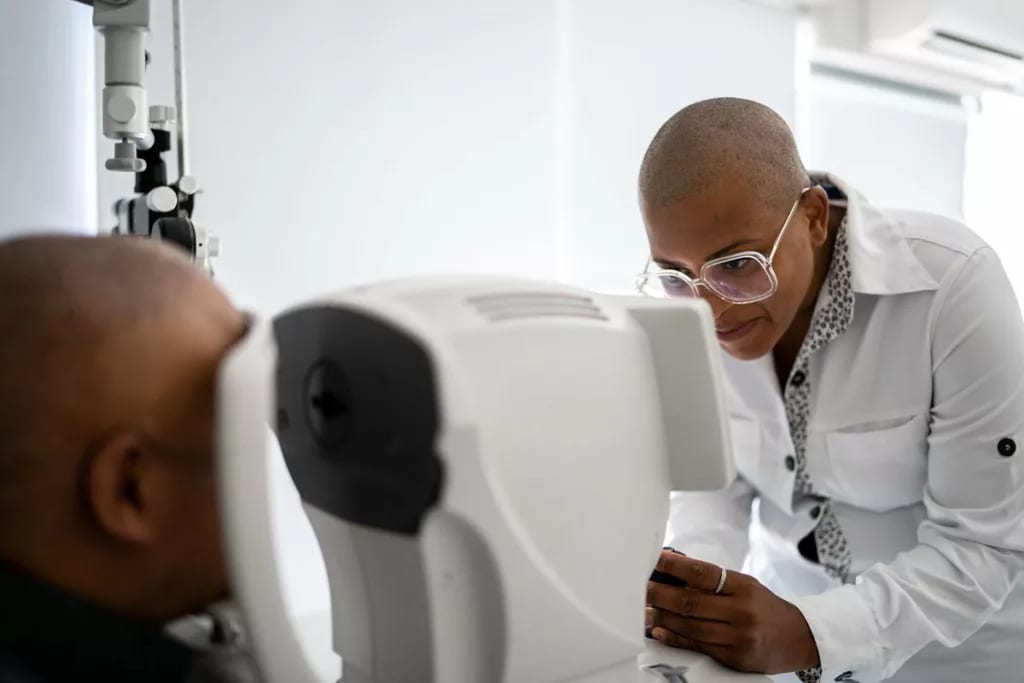 Person getting their eyes scanned by tech. ji.width .jpg