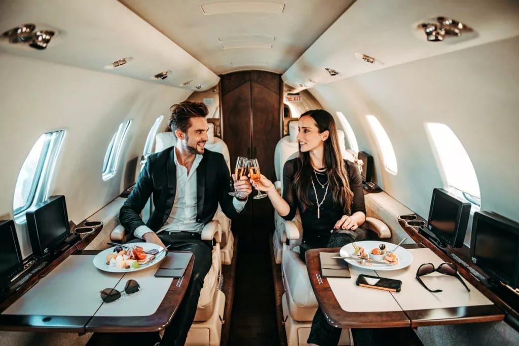 Successful couple making a toast with champag.width xXDQko.jpg