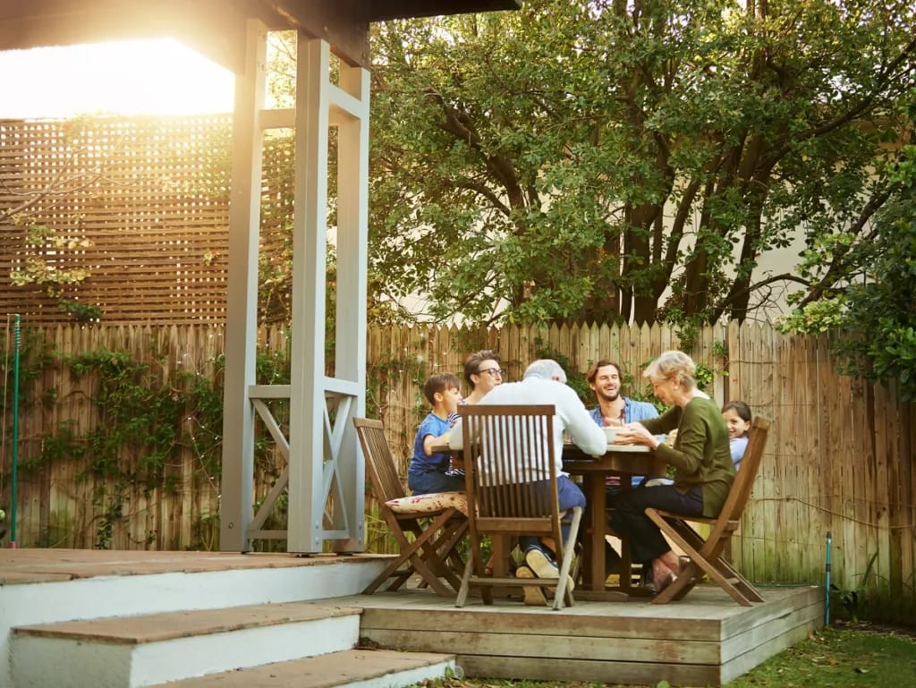 family eating on back deck.width .jpg