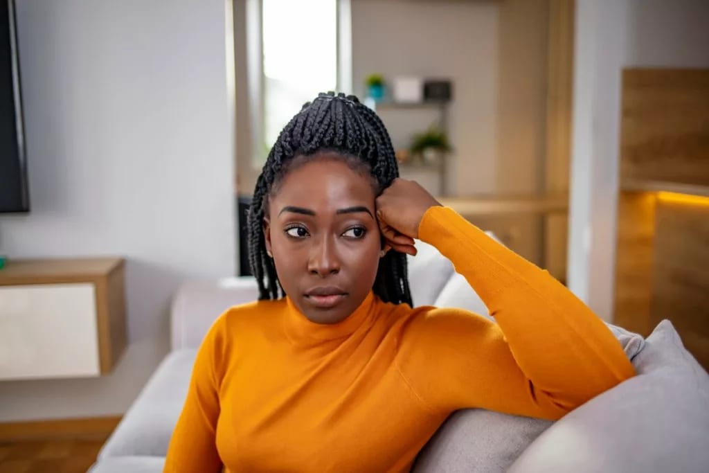 person looking stressed on couch JHTgI.width .jpg