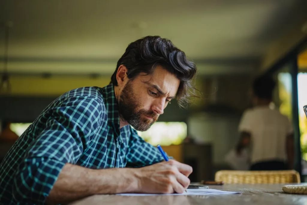 person writing letter wLKZjKy.width .jpg