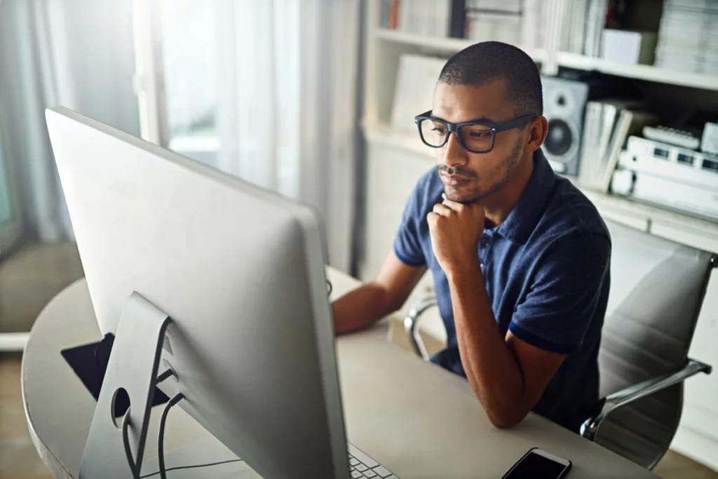 serious young man at computer.width .jpg