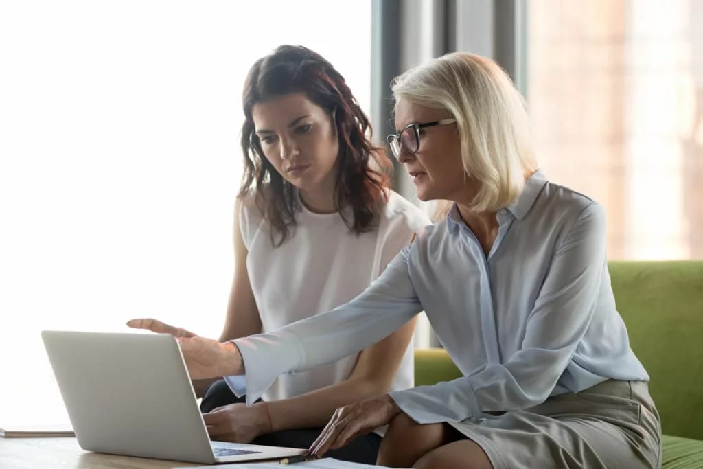 woman financial advisor with client hNlfJJ.width .jpg