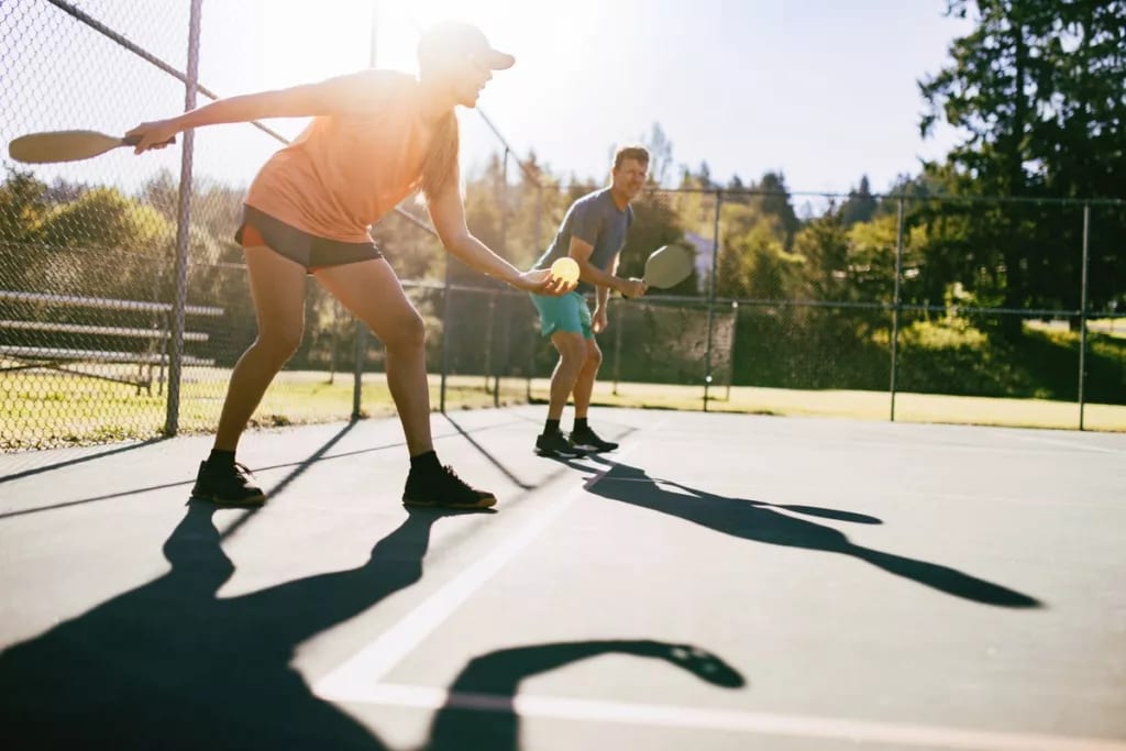 Pickleball players on a court. RTxCCV.width .jpg
