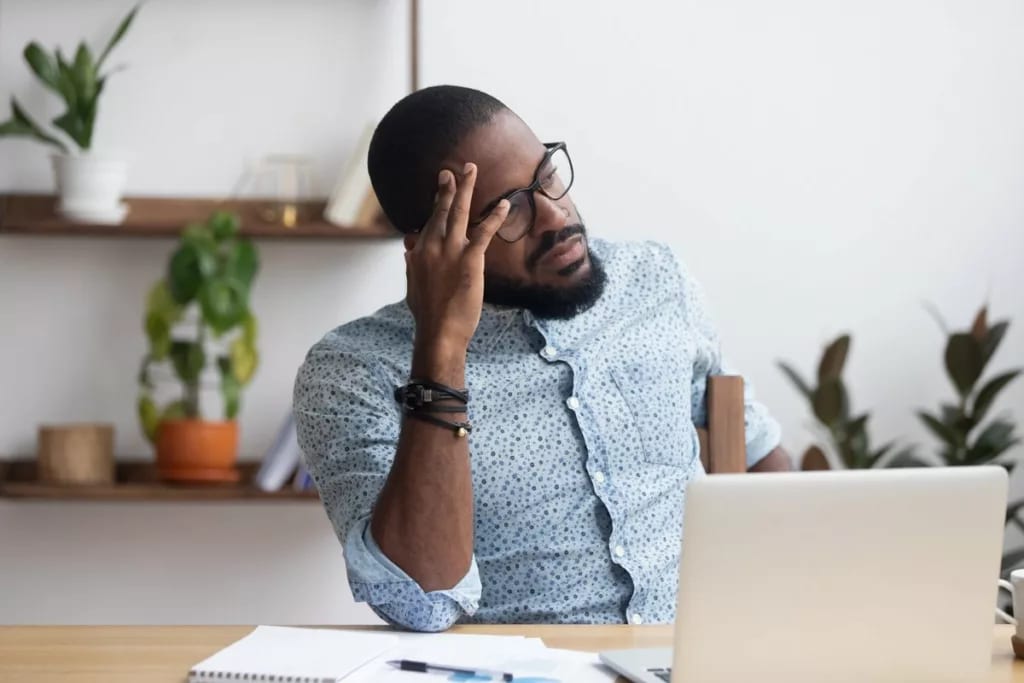 Stressed man at desk Jynnia.width .jpg