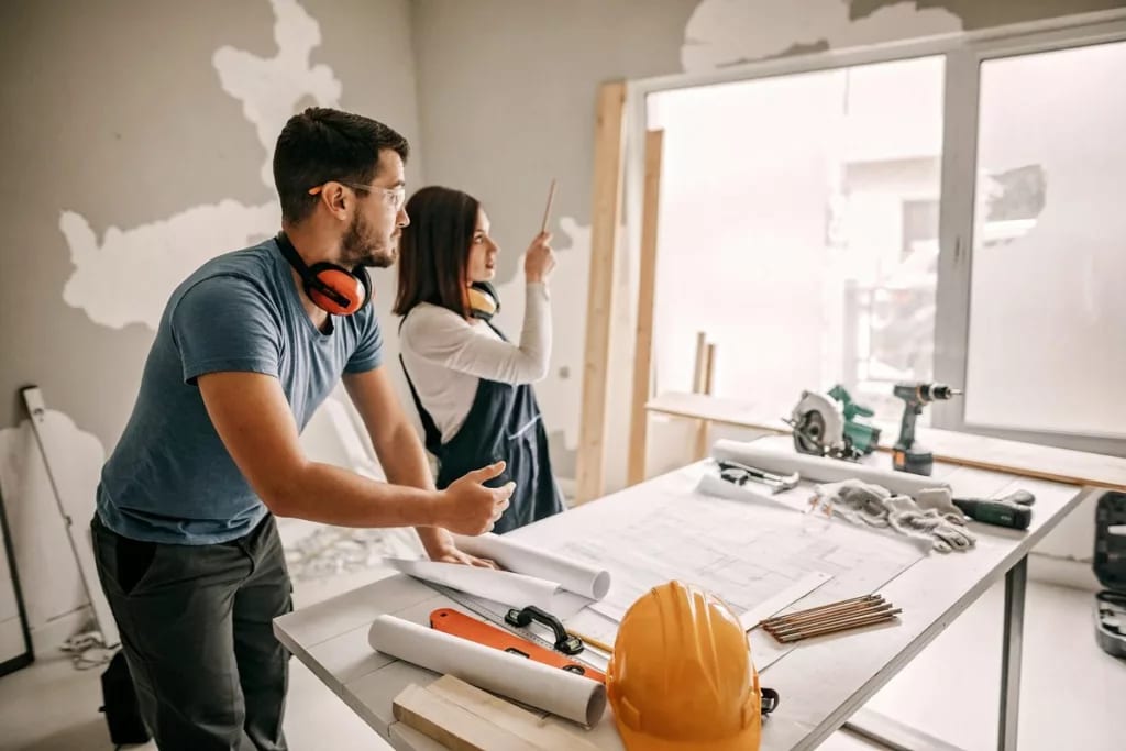 Young couple remodeling home NoNjxc.width .jpg