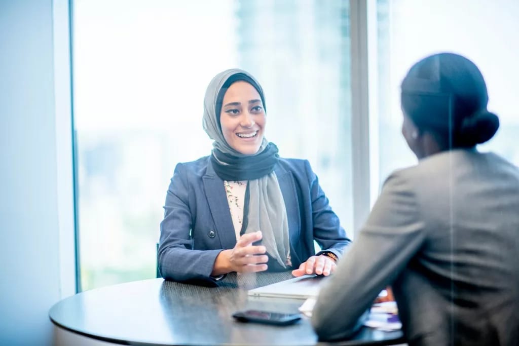 two people in office meeting EfIbzFz.width .jpg