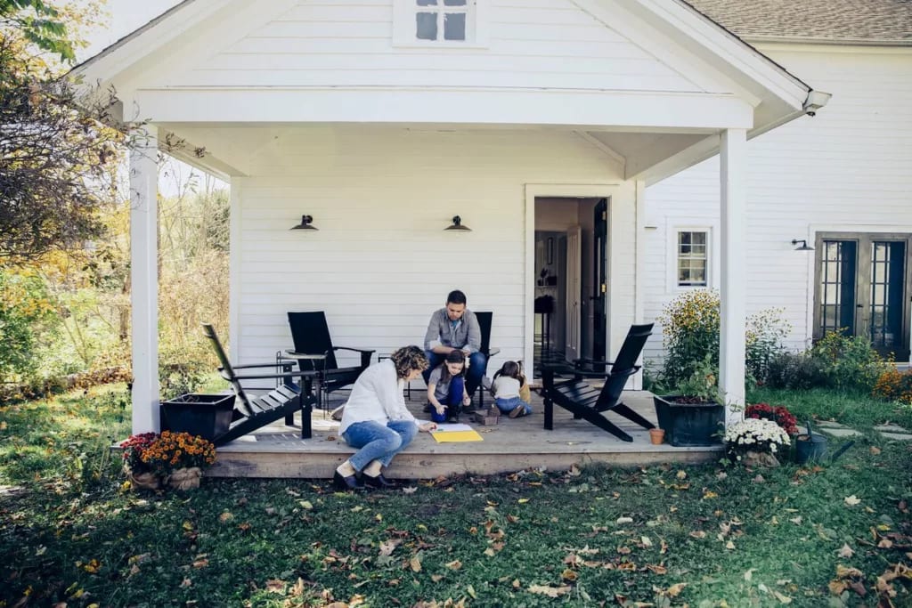 Family spending time together on the front po.width HPuOGMS.jpg