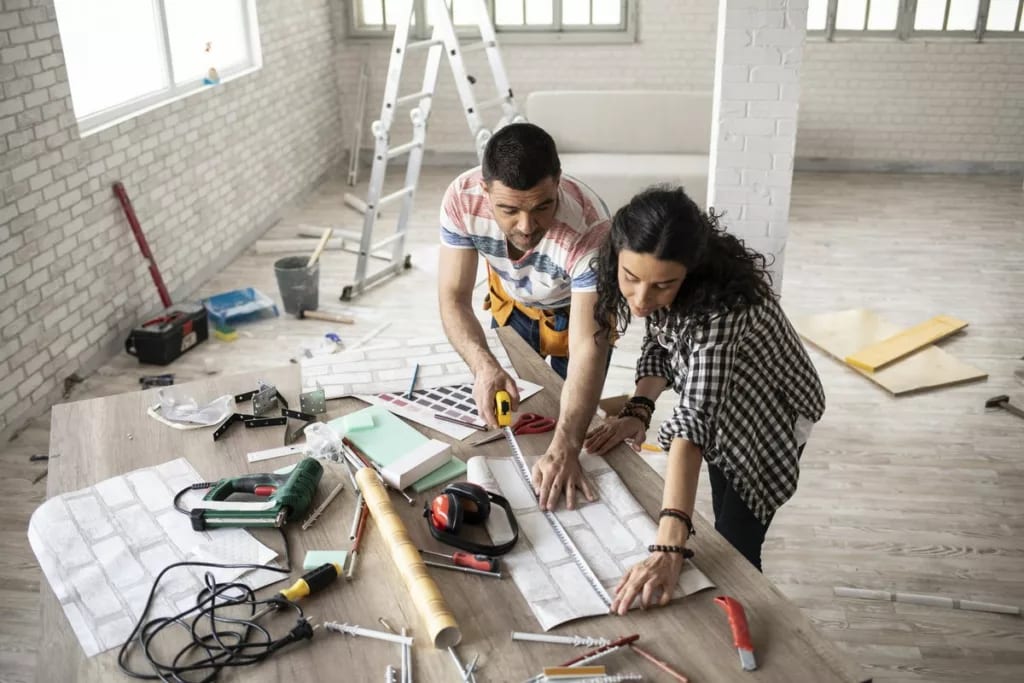 couple making home improvements.width .jpg