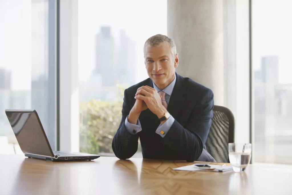 man biz suit desk gettyimages .jpg