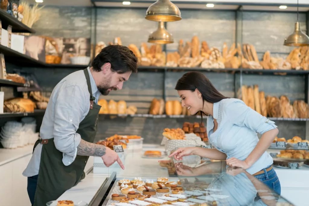 woman buying pastry at bakery.width .jpg