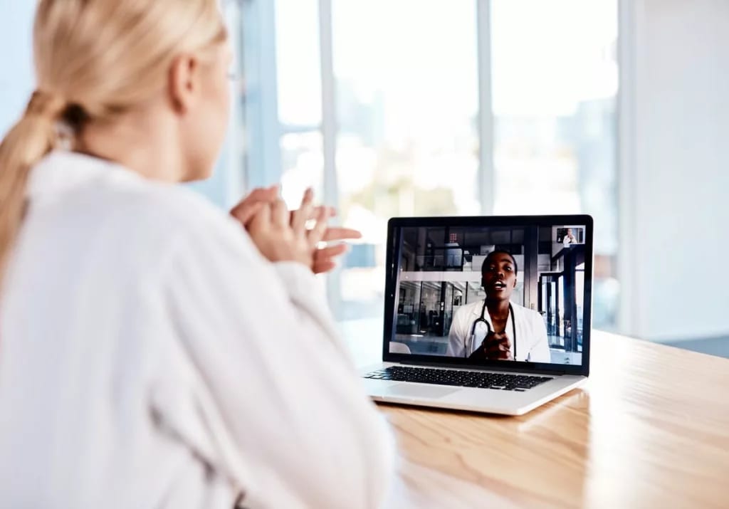 woman video chat with doctor.width .jpg