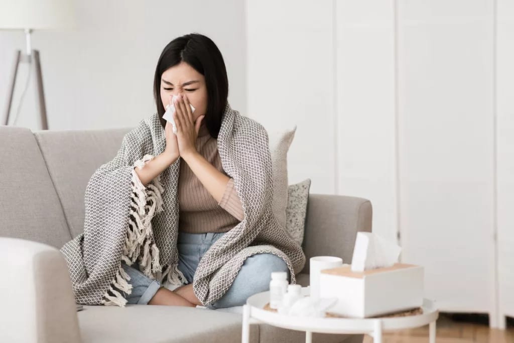 Sick woman blowing nose qBgNC.width .jpg