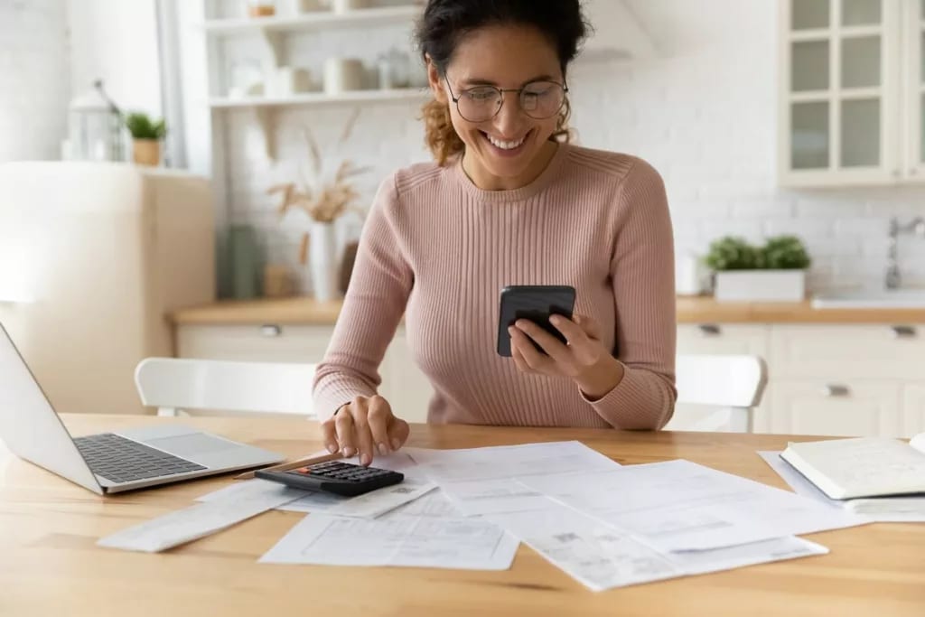 Woman working on her tax documents. fbmsSE.width .jpg