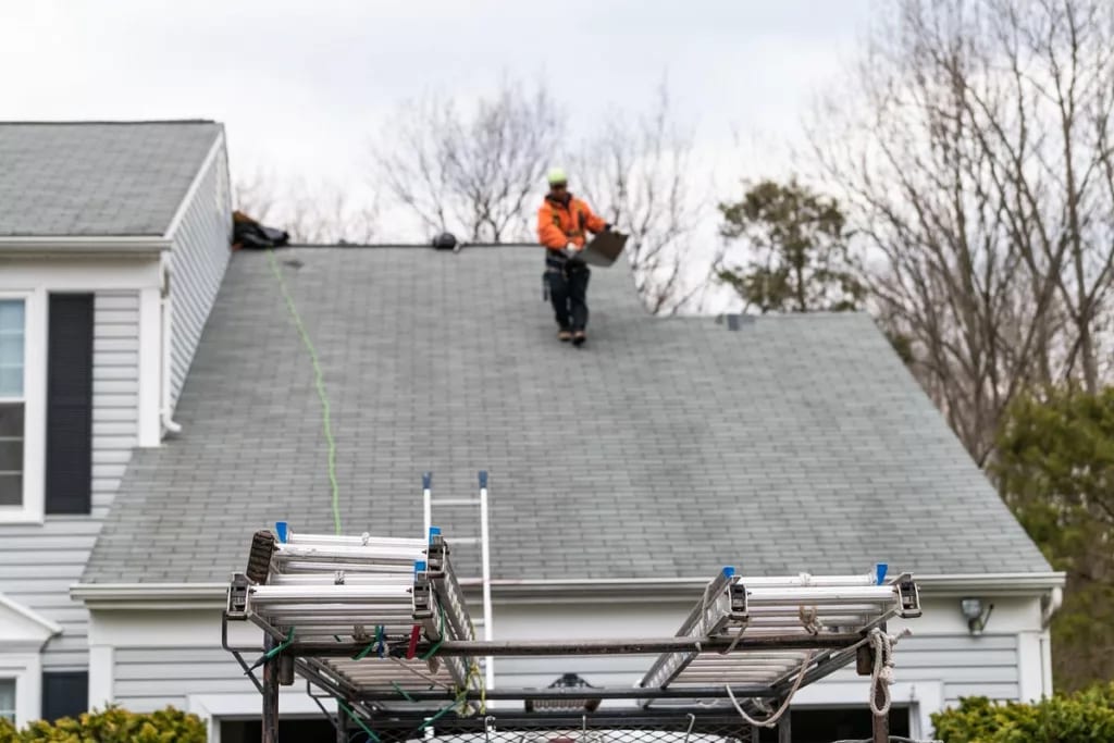 roofer on top of house oTuYRk.width .jpg