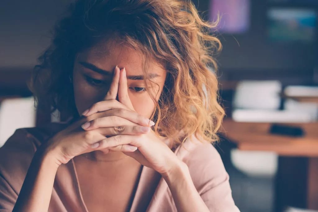 Stressed young woman MFpaWjw.width .jpg