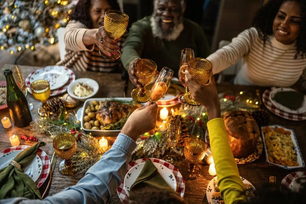 family around holiday dinner table OkFSKM.width .jpg