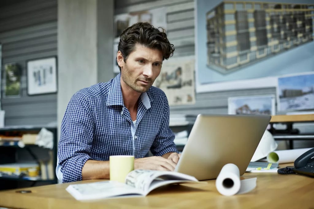 man s laptop concentrating gettyimages .jpg