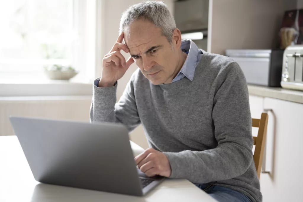 older man laptop serious gettyimages .jpg