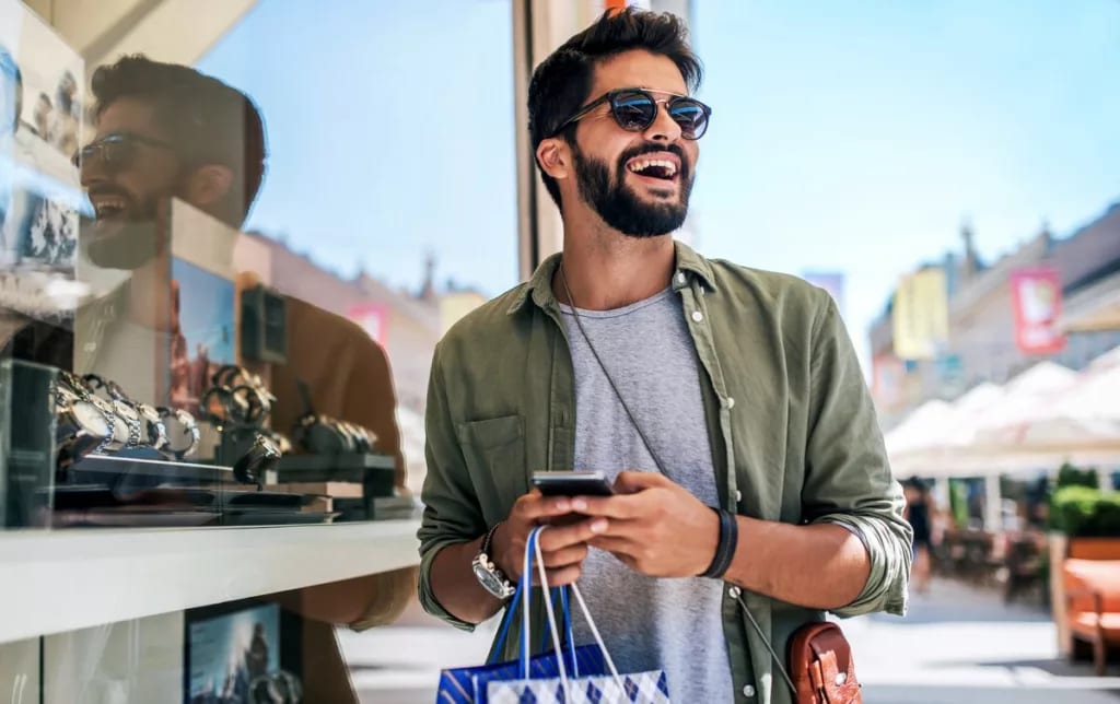person with shopping bag outisde jewelry stor.width dpprV.jpg